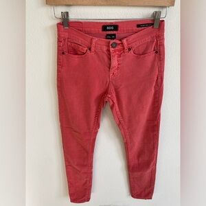 BDG mid rise twig ankle jean. Color burnt red